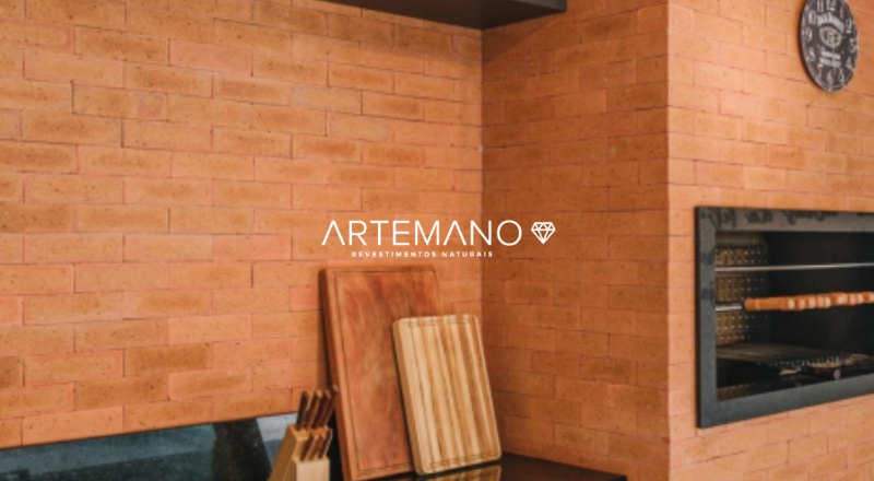 Area gourmet com revestimento de tijolinho aplicado nas paredes